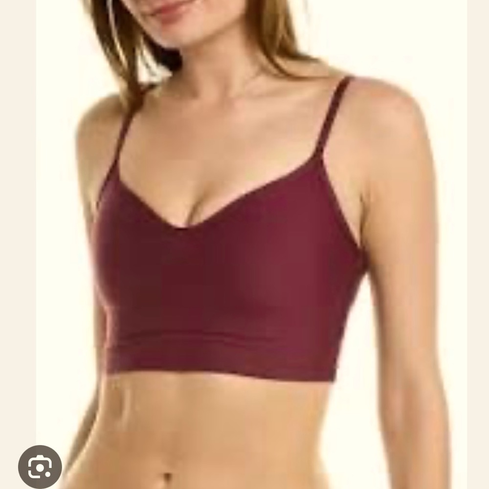 Bandier Lotus bra top and matching leggings in plum color both size small